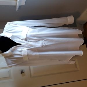 NWOT white Apollo v-neck tunic top. White with roll tab sleeves.
